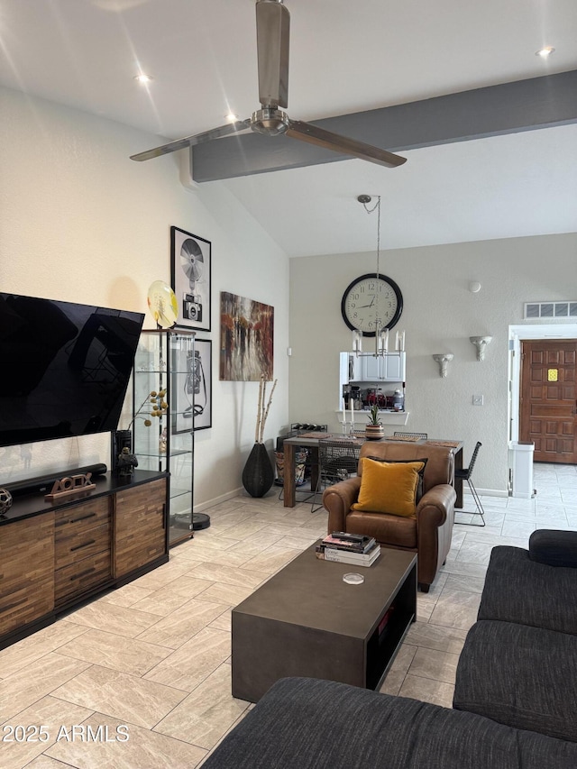 living area with visible vents, baseboards, lofted ceiling with beams, and a ceiling fan