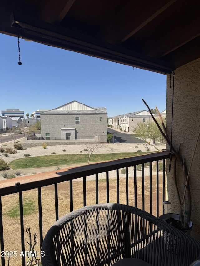 balcony featuring a residential view