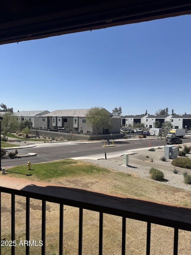 balcony featuring a residential view