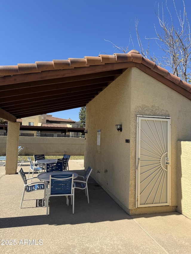 view of patio with outdoor dining space