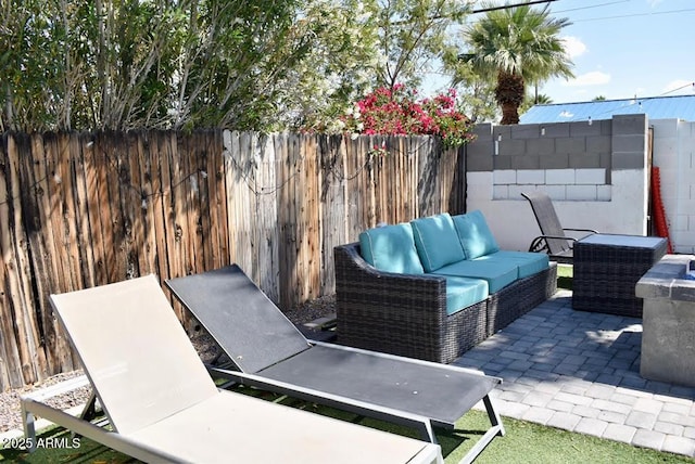 7635 E Verde Ln, Scottsdale, AZ 85251 - view of patio with an outdoor living space and a fenced backyard