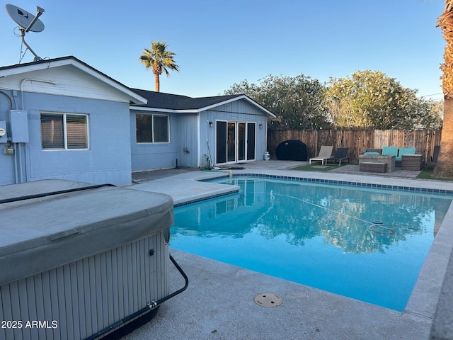 7635 E Verde Ln, Scottsdale, AZ 85251 - view of pool with a patio, a fenced in pool, outdoor lounge area, a hot tub, and fence