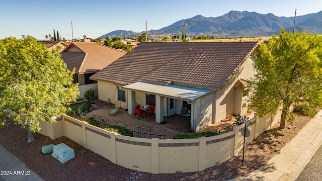 exterior space featuring a mountain view