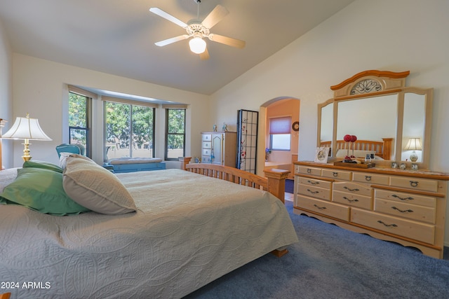 carpeted bedroom featuring ceiling fan and lofted ceiling