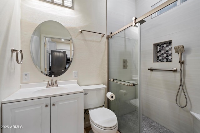 12943 W Mclellan Rd, Glendale, AZ 85307 - bathroom with vanity, toilet, and a stall shower