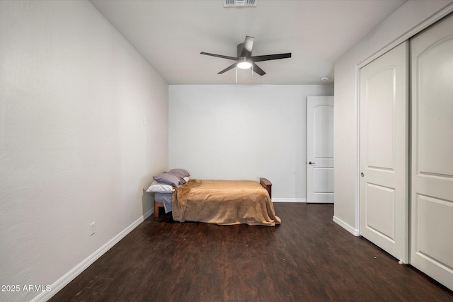 12943 W Mclellan Rd, Glendale, AZ 85307 - bedroom with wood finished floors, ceiling fan, visible vents, and baseboards