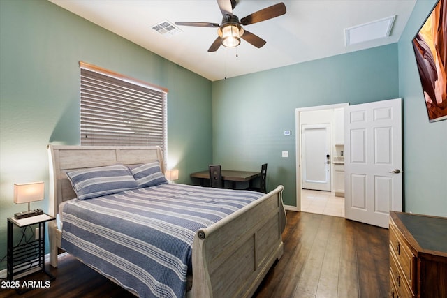 12943 W Mclellan Rd, Glendale, AZ 85307 - bedroom featuring dark wood-style flooring, visible vents, ceiling fan, and baseboards