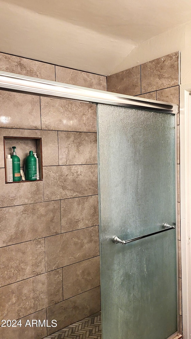 bathroom featuring a stall shower