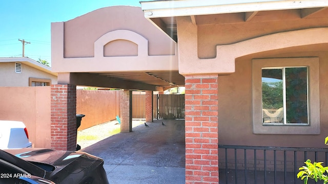 view of patio featuring fence