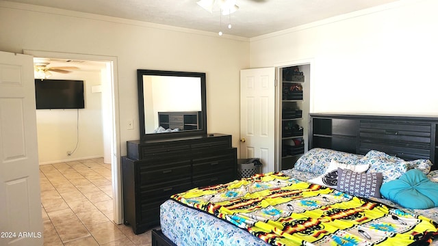 bedroom featuring light tile patterned floors and crown molding