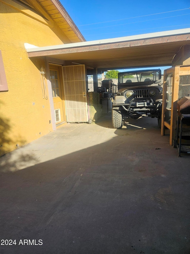 view of car parking featuring a carport