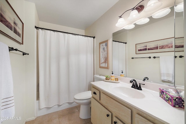 bathroom with shower / bath combo with shower curtain, toilet, vanity, and tile patterned flooring