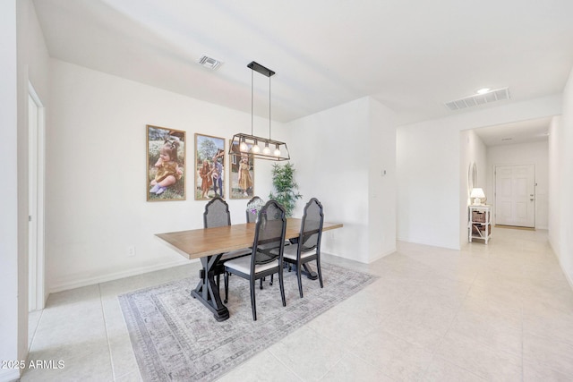 4911 N 193rd Ave, Litchfield Park, AZ 85340 - dining area featuring light tile patterned floors, baseboards, recessed lighting, and a chandelier