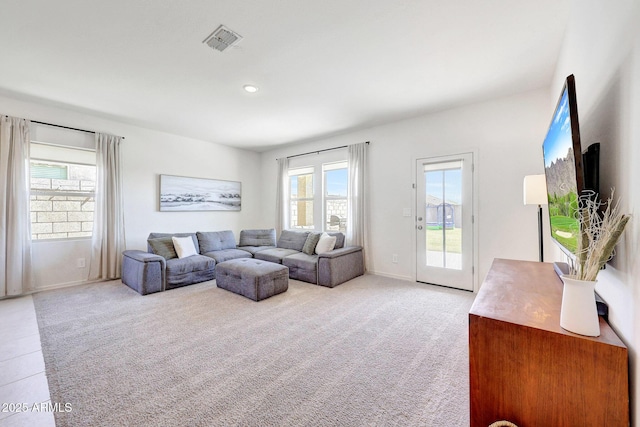4911 N 193rd Ave, Litchfield Park, AZ 85340 - living room with plenty of natural light, light carpet, baseboards, and recessed lighting