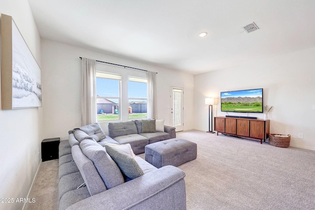 4911 N 193rd Ave, Litchfield Park, AZ 85340 - living room featuring light colored carpet and baseboards