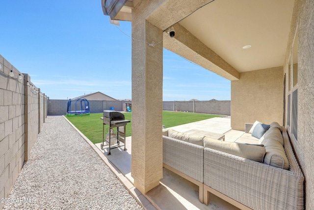 4911 N 193rd Ave, Litchfield Park, AZ 85340 - view of patio featuring a trampoline and an outdoor hangout area