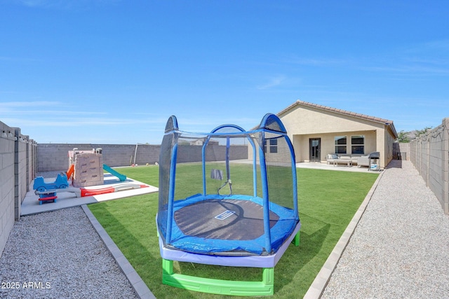 4911 N 193rd Ave, Litchfield Park, AZ 85340 - view of yard featuring a trampoline, a playground, a patio area, and an outdoor hangout area