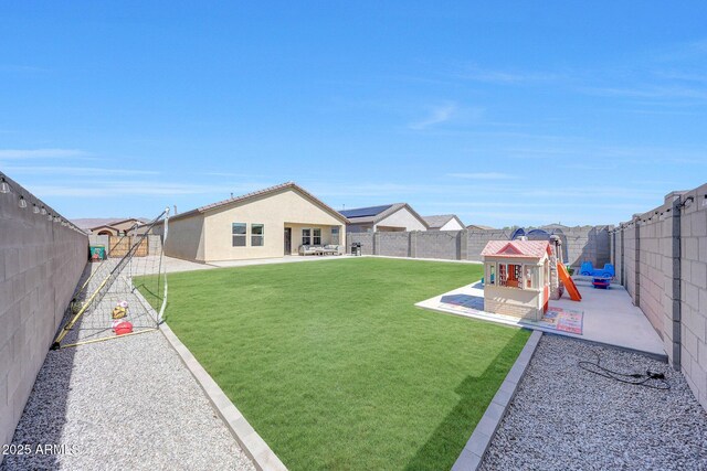 4911 N 193rd Ave, Litchfield Park, AZ 85340 - view of yard with a patio and a playground
