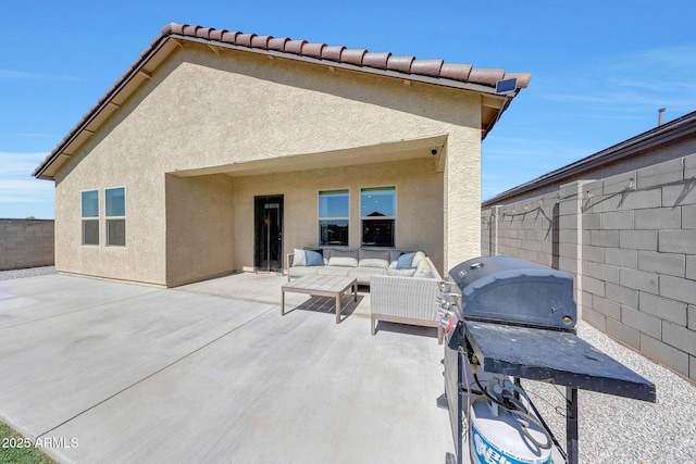 4911 N 193rd Ave, Litchfield Park, AZ 85340 - fenced backyard featuring a patio area, an outdoor living space, and grilling area