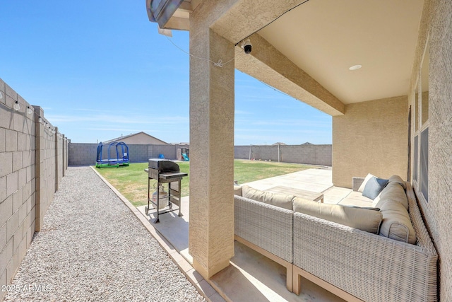 4911 N 193rd Ave, Litchfield Park, AZ 85340 - view of patio featuring a trampoline and an outdoor living space