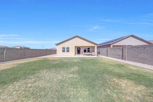 4911 N 193rd Ave, Litchfield Park, AZ 85340 - rear view of house featuring stucco siding and a patio area