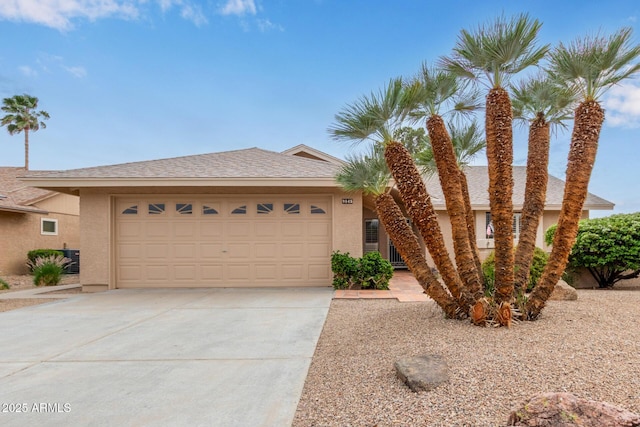 9845 W Behrend Dr, Peoria, AZ 85382 - ranch-style house featuring stucco siding, an attached garage, and concrete driveway