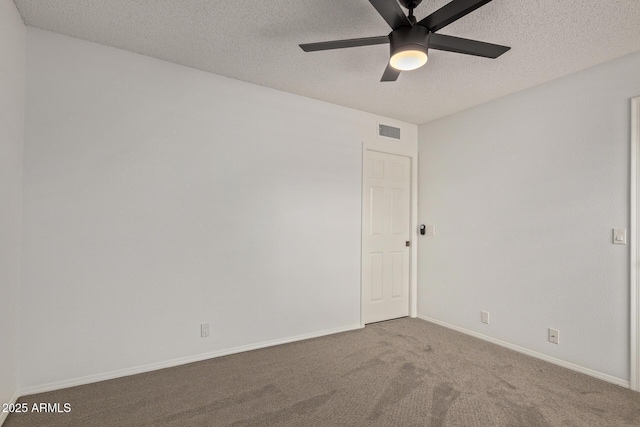 9845 W Behrend Dr, Peoria, AZ 85382 - carpeted spare room featuring a textured ceiling, baseboards, ceiling fan, and visible vents