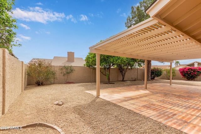 9845 W Behrend Dr, Peoria, AZ 85382 - view of patio / terrace with a pergola and a fenced backyard