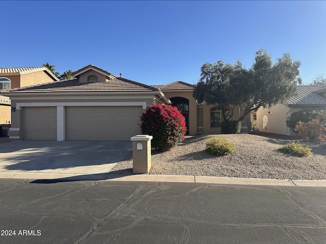 view of front of house with a garage