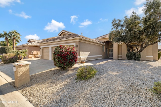 view of front of home with a garage