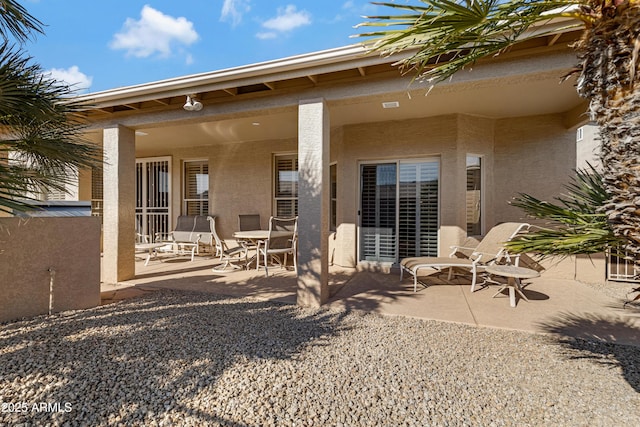 back of house featuring a patio area