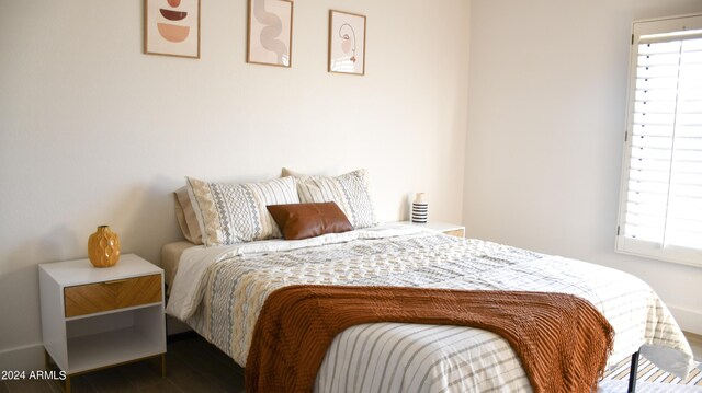 bedroom featuring multiple windows