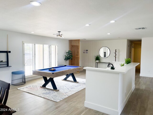 game room featuring light wood-type flooring and pool table