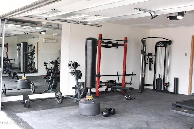 workout area with an AC wall unit