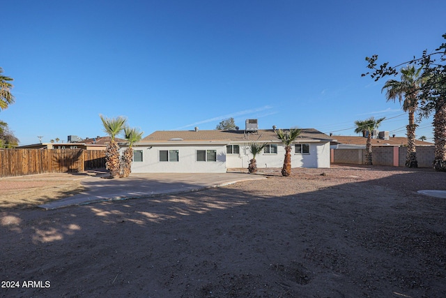 ranch-style house with a patio