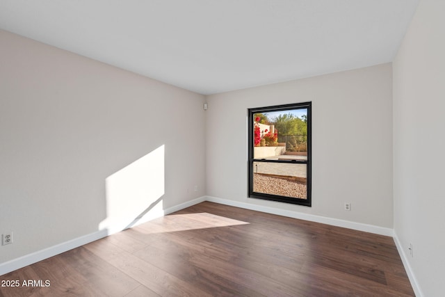 unfurnished room featuring wood-type flooring