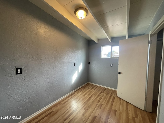 laundry room featuring light hardwood / wood-style floors