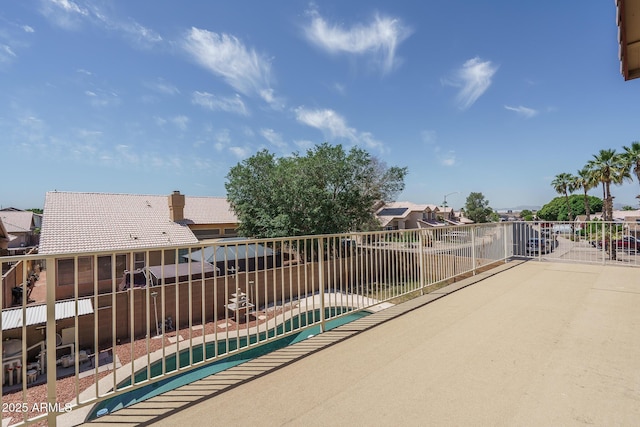 exterior space with a fenced in pool, a fenced backyard, a patio area, and a residential view