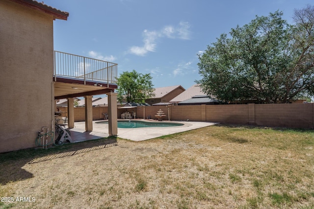 exterior space featuring a fenced backyard, a fenced in pool, and a patio