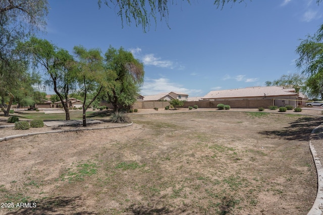view of yard featuring fence