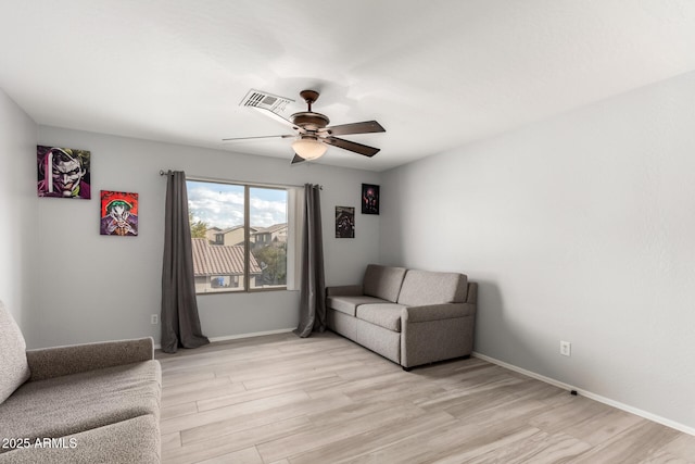 interior space featuring ceiling fan and light hardwood / wood-style flooring