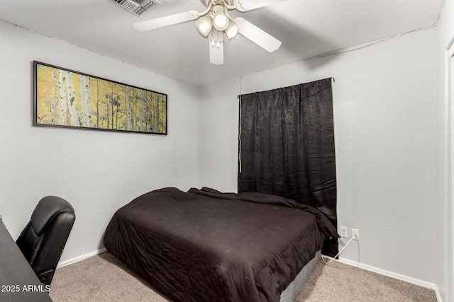 bedroom with ceiling fan and carpet floors