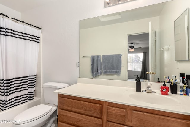 full bathroom with toilet, ceiling fan, shower / tub combo, and vanity