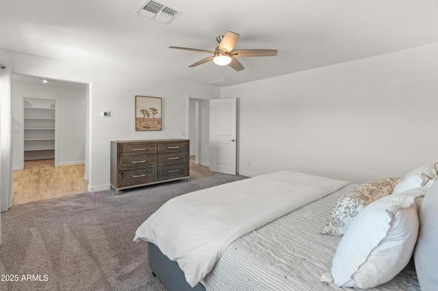 14435 W El Cortez Pl, Surprise, AZ 85387 - bedroom with carpet, baseboards, and a ceiling fan