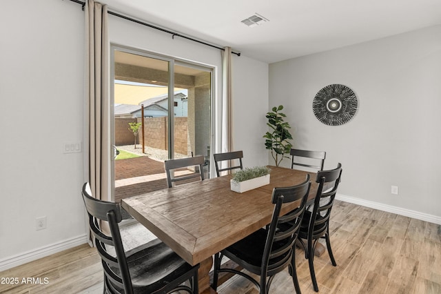14435 W El Cortez Pl, Surprise, AZ 85387 - dining space featuring light wood-type flooring and baseboards