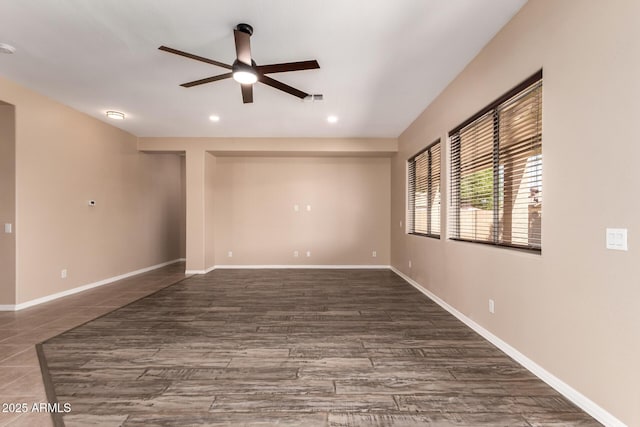 empty room featuring baseboards, a ceiling fan, visible vents, and recessed lighting
