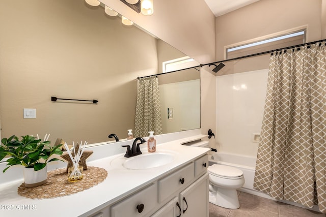 bathroom with vanity, toilet, shower / tub combo, and tile patterned flooring