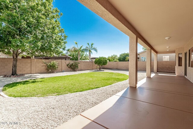 16837 W Northampton Rd, Surprise, AZ 85374 - fenced backyard featuring a patio area