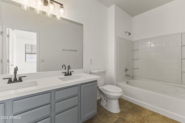 full bathroom featuring tile patterned flooring, vanity, toilet, and shower / washtub combination