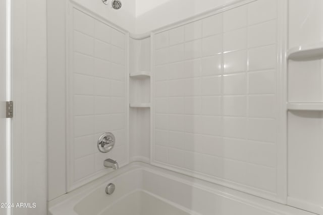 bathroom with shower / bathing tub combination